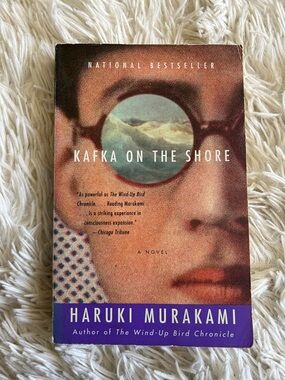 Kafka on the Shore by Haruki Murakami - Paperback with Brown and Purple Cover